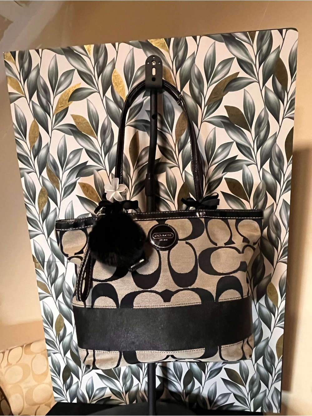 Coach Black and Cream Signature Tote with Pom-Pom Charm